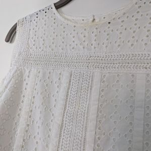 Sleeveless eyelet mini dress with POCKETS